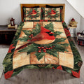 Red cardinal songbird evergreen botanical bedding set displayed neatly on a bed in a rustic winter bedroom