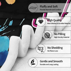 Watercolor splatter volleyball throw blanket view 4 showing neon athletic graphics and paint drips