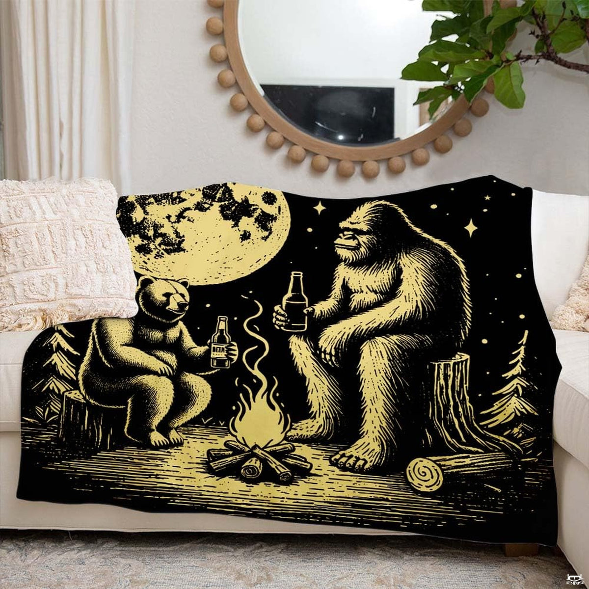 Side angle of the gold bedding set showcasing the bear and Sasquatch campfire graphics in warm room lighting.