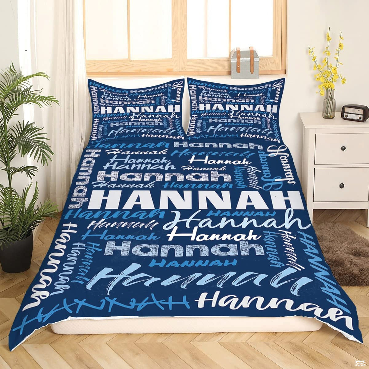 Matching pillow sham detail for typography bedding set displaying dense multi-font lettering in bedroom setting