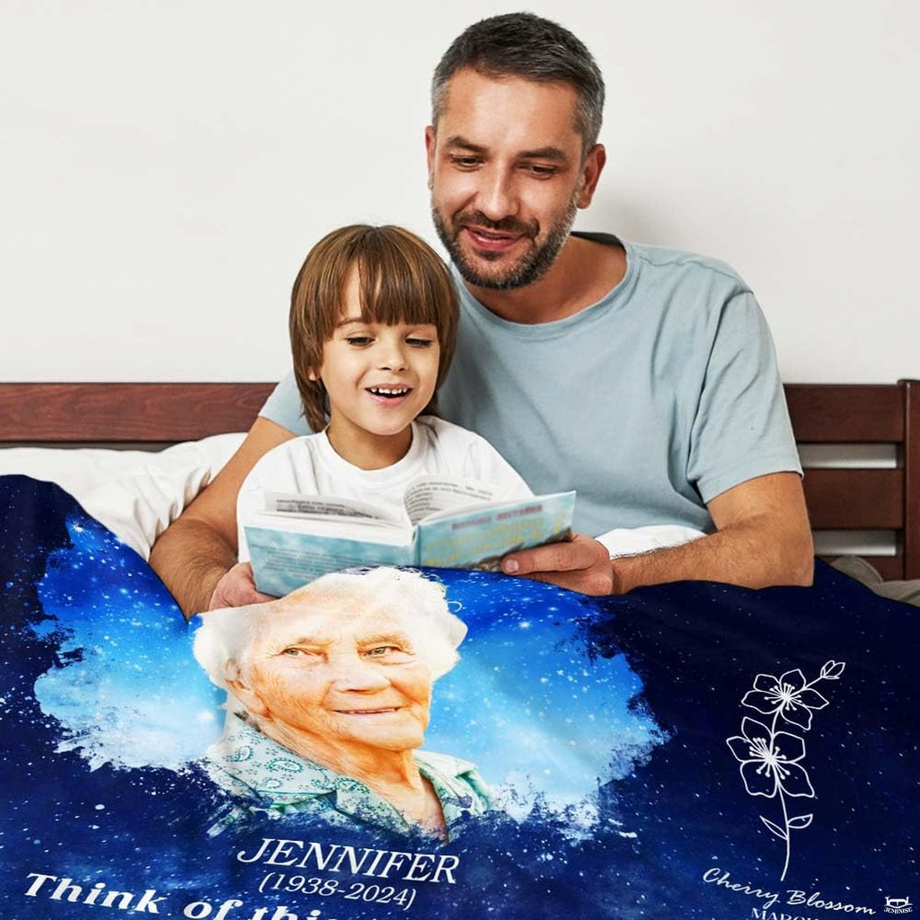 Memorial portrait artwork with celestial stars and swirling clouds draped during a quiet family moment