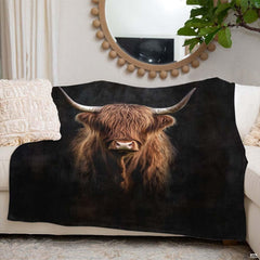Dramatic portrait of Scottish Highland cow with curved horns emerging from black background, view 5.