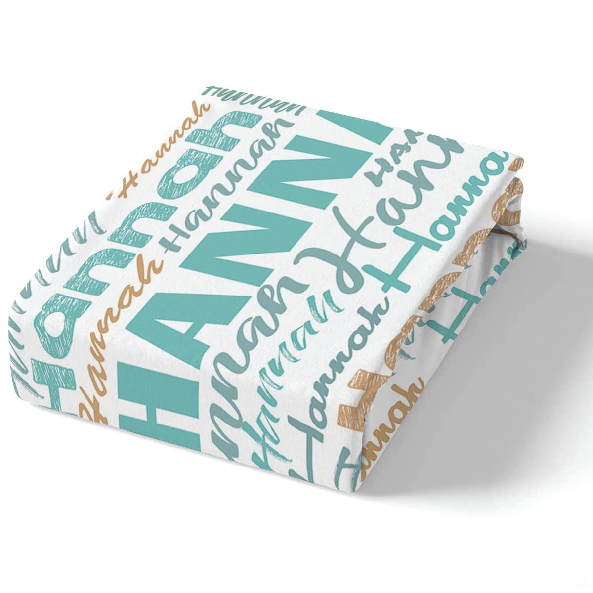 Corner fold view of typography bedding highlighting sharp turquoise and tan graphic printing