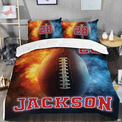 Close-up of the pebbled football texture, white laces, and blazing fiery embers on an athletic bedding set