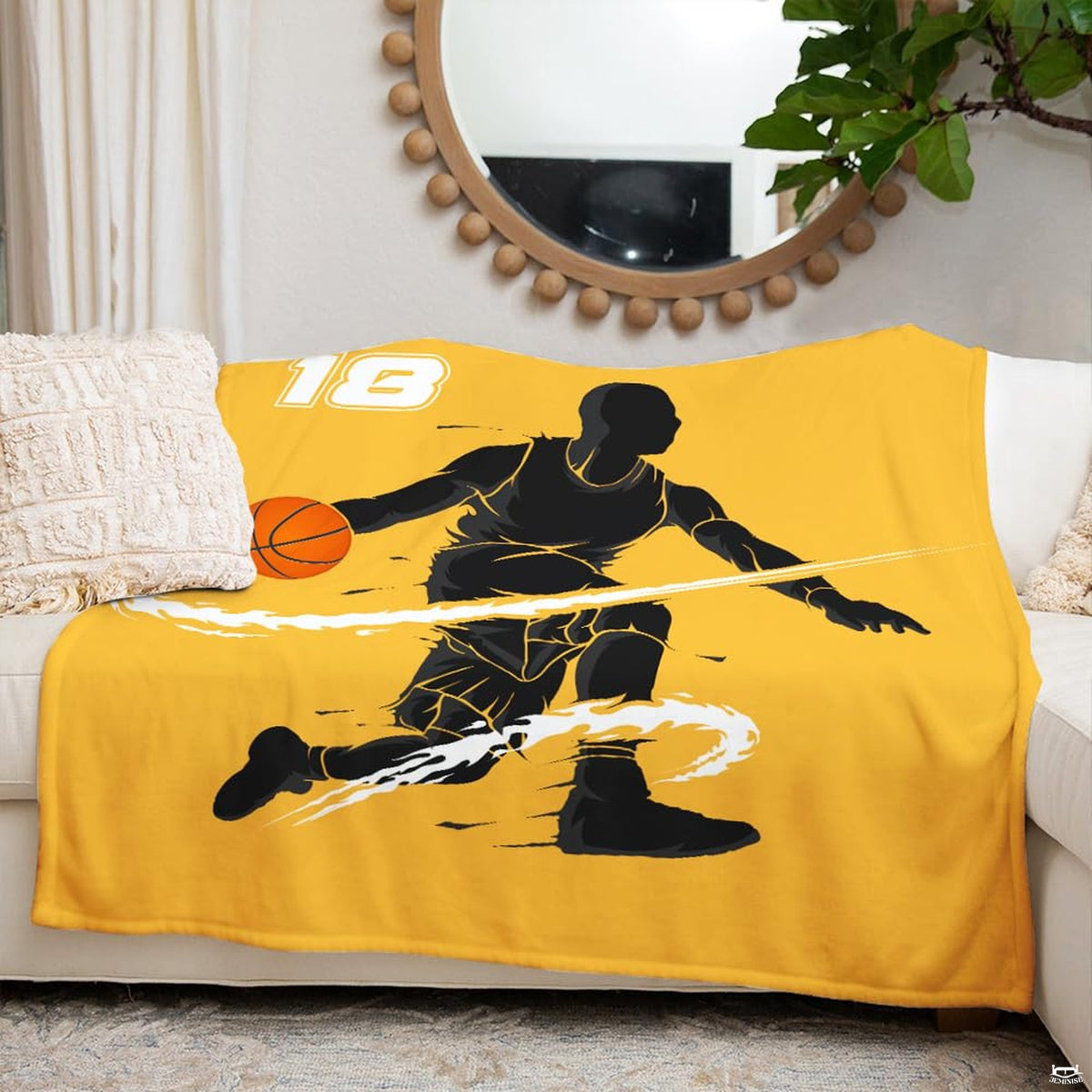 Folded corner presentation of yellow basketball dribble blanket showing bold colors