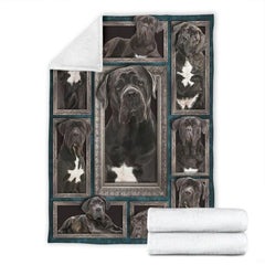 Macro view capturing ornate antique picture frame borders and majestic canine artwork.