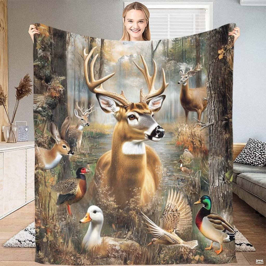 Full display of the wildlife montage throw blanket showing the buck deer and woodland waterfowl illustration