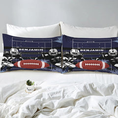 Overhead view of football playbook diagram sports bedding arranged neatly across an interior bedroom bed