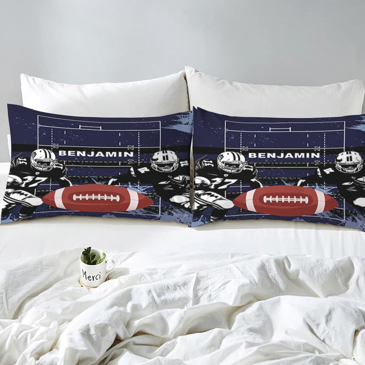 Overhead view of football playbook diagram sports bedding arranged neatly across an interior bedroom bed