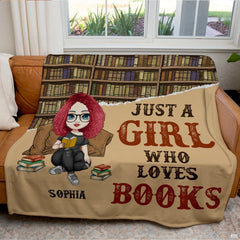 Close-up shot of chibi reader character and glasses on book lover throw blanket.