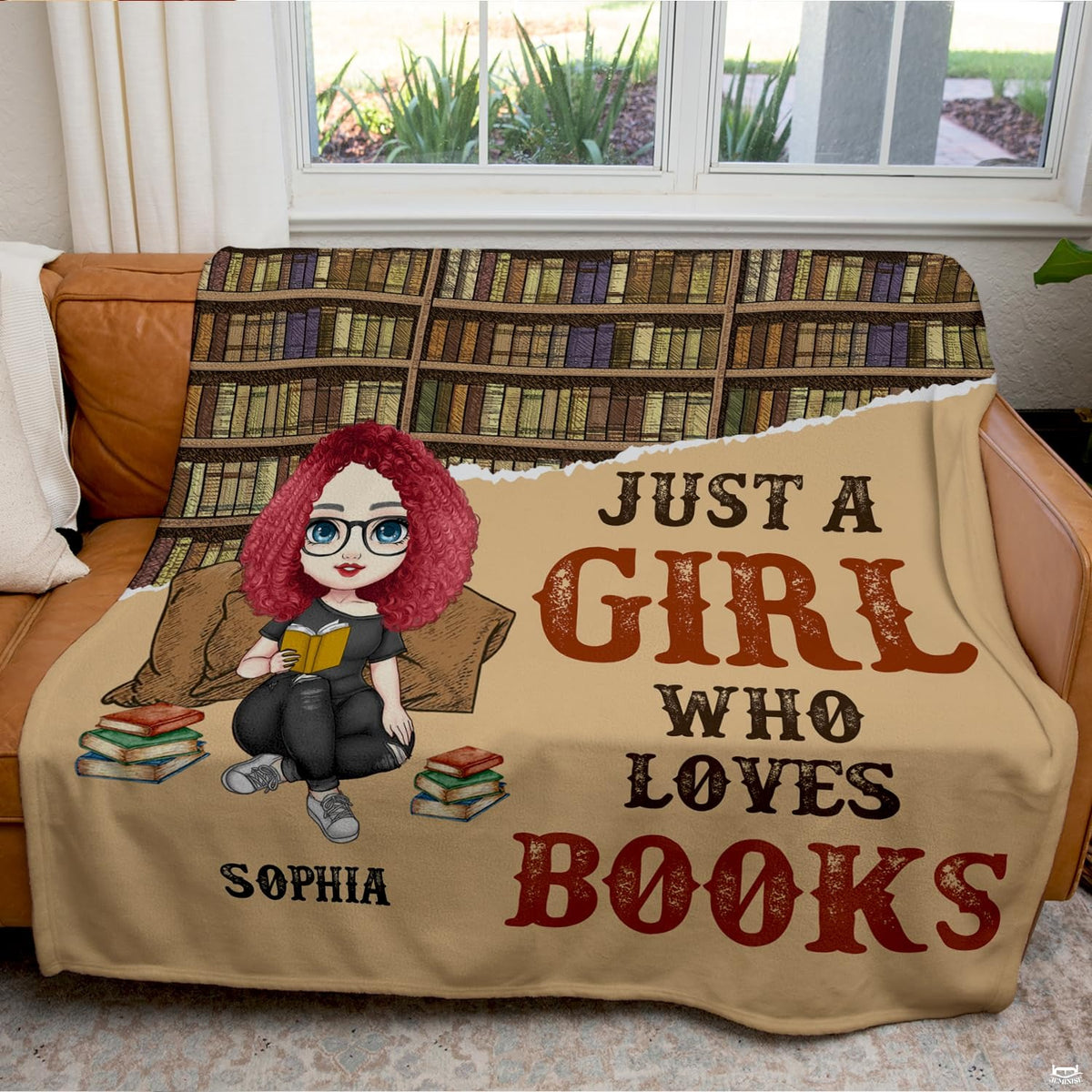 Close-up shot of chibi reader character and glasses on book lover throw blanket.
