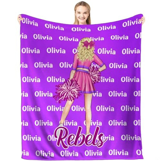 Cheerleader blanket featuring pink pom-poms and magenta uniform on purple typography background.