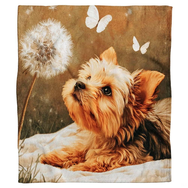 Close-up of the painted Yorkshire Terrier face looking up with wonder, showing golden facial fur and dark eyes