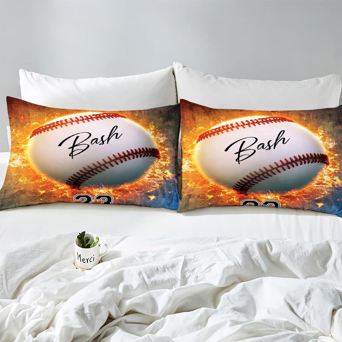 Side angle view of athletic sports bedding showing crimson maroon and golden yellow tones draped on mattress