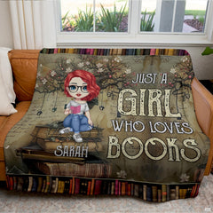 Detailed view of cartoon bookworm girl reading a pink book on literary throw blanket.