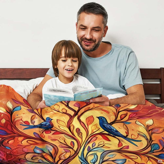 Close view of two sapphire bluebirds perched upon arched branches of vibrant Tree of Life