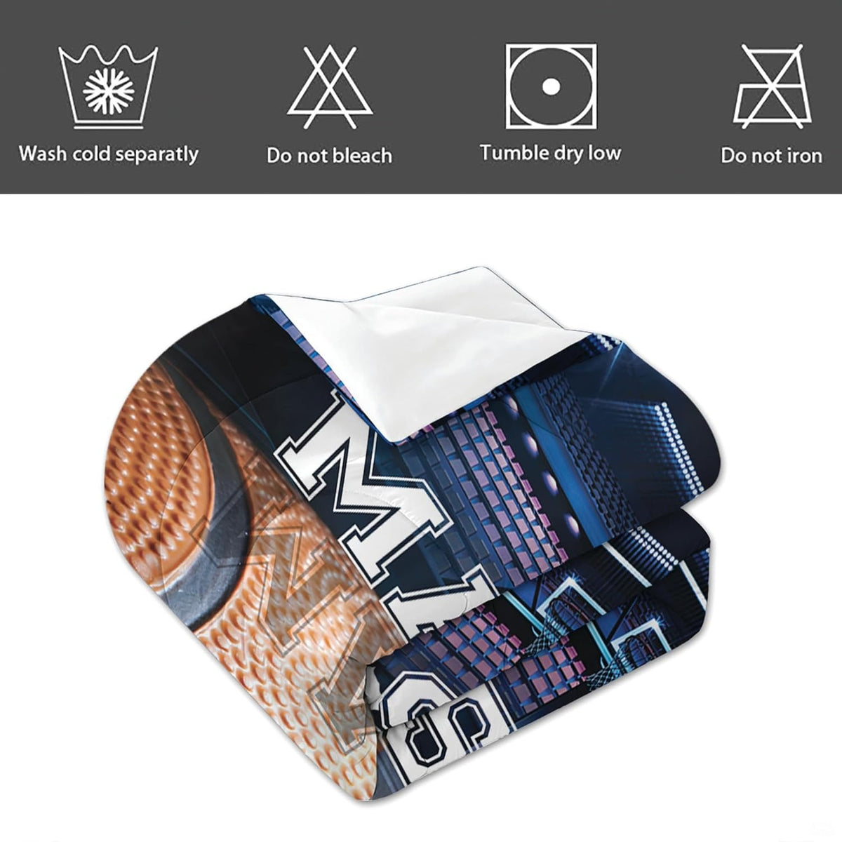 Detailed view of pillow shams and bedding border on royal blue basketball court bedding in a teen room
