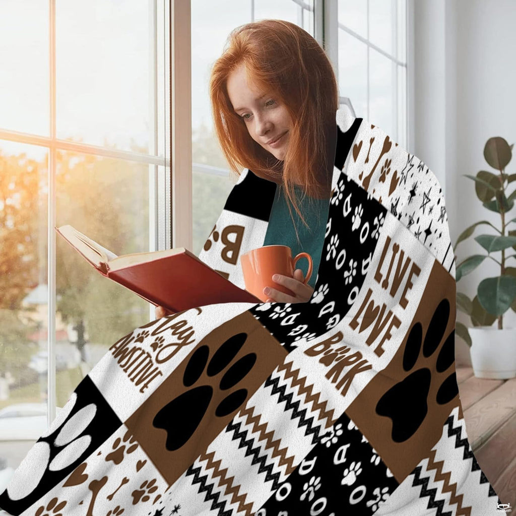 Chocolate brown dog paw throw blanket view 4 highlighting patchwork pattern squares, bones, and stripes