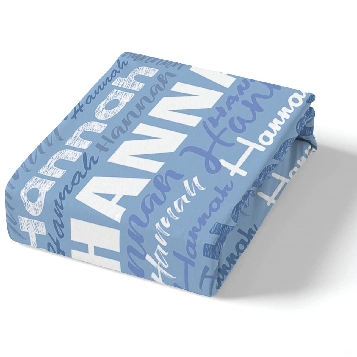 Corner fold view of typography bedding highlighting sharp periwinkle and white graphic printing