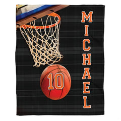 Basketball hoop and ball sports action throw blanket with vibrant orange rim and white net on black