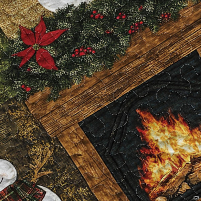 Close-up view of holiday bedding showcasing snowman illustration, golden star, and pine wreath