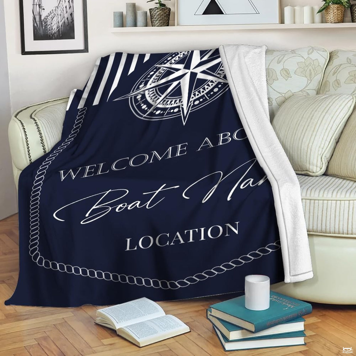 Stylized overhead look at nautical cabana stripes and rope accents for a navy coastal bedroom.