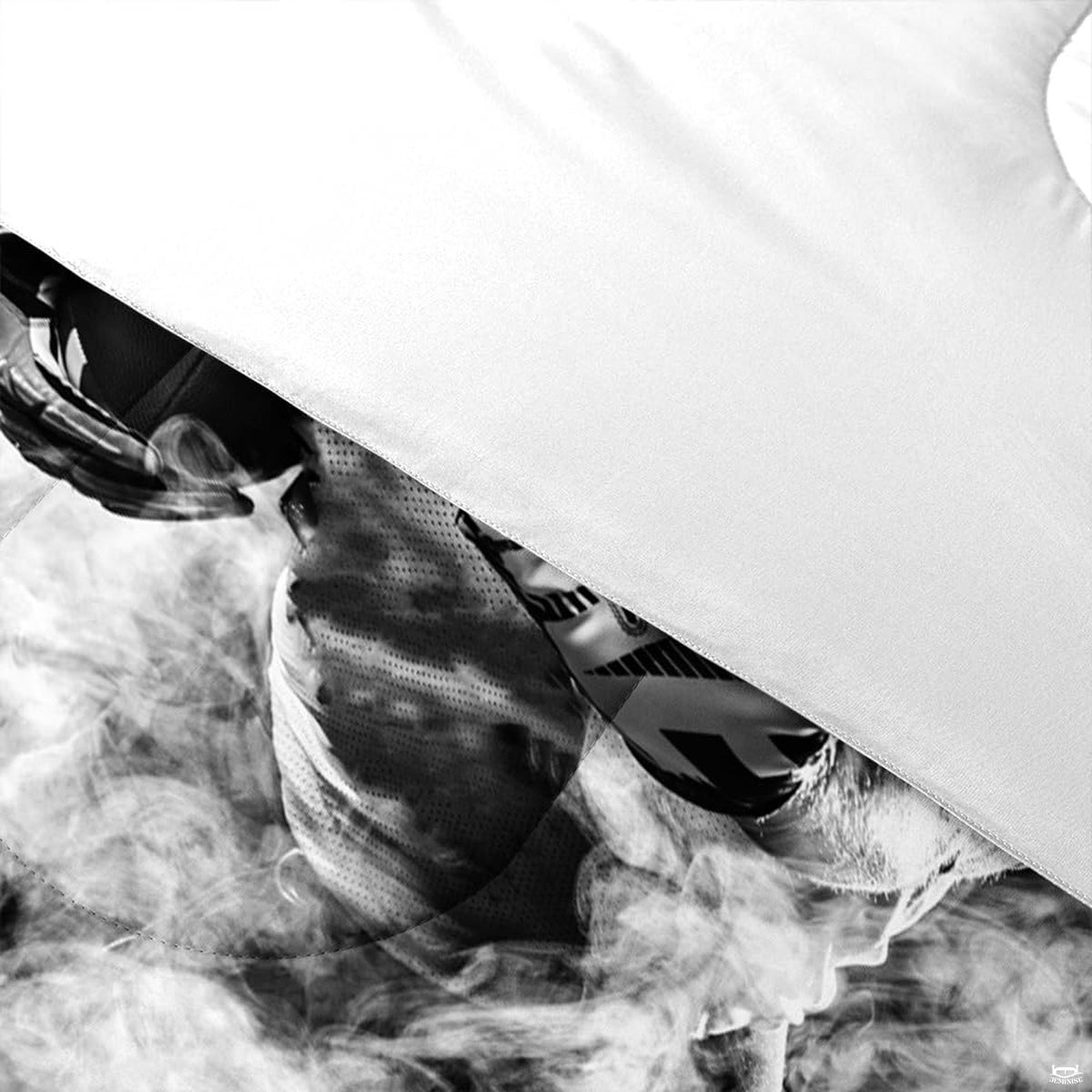 Angle view of athletic bedding illustrating platinum silver and deep charcoal graphic textures