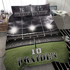 Close-up perspective of sports bedding detailing textured football lacing and athletic collegiate typography