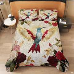 Overhead view of rose hummingbird design with golden sunburst rays