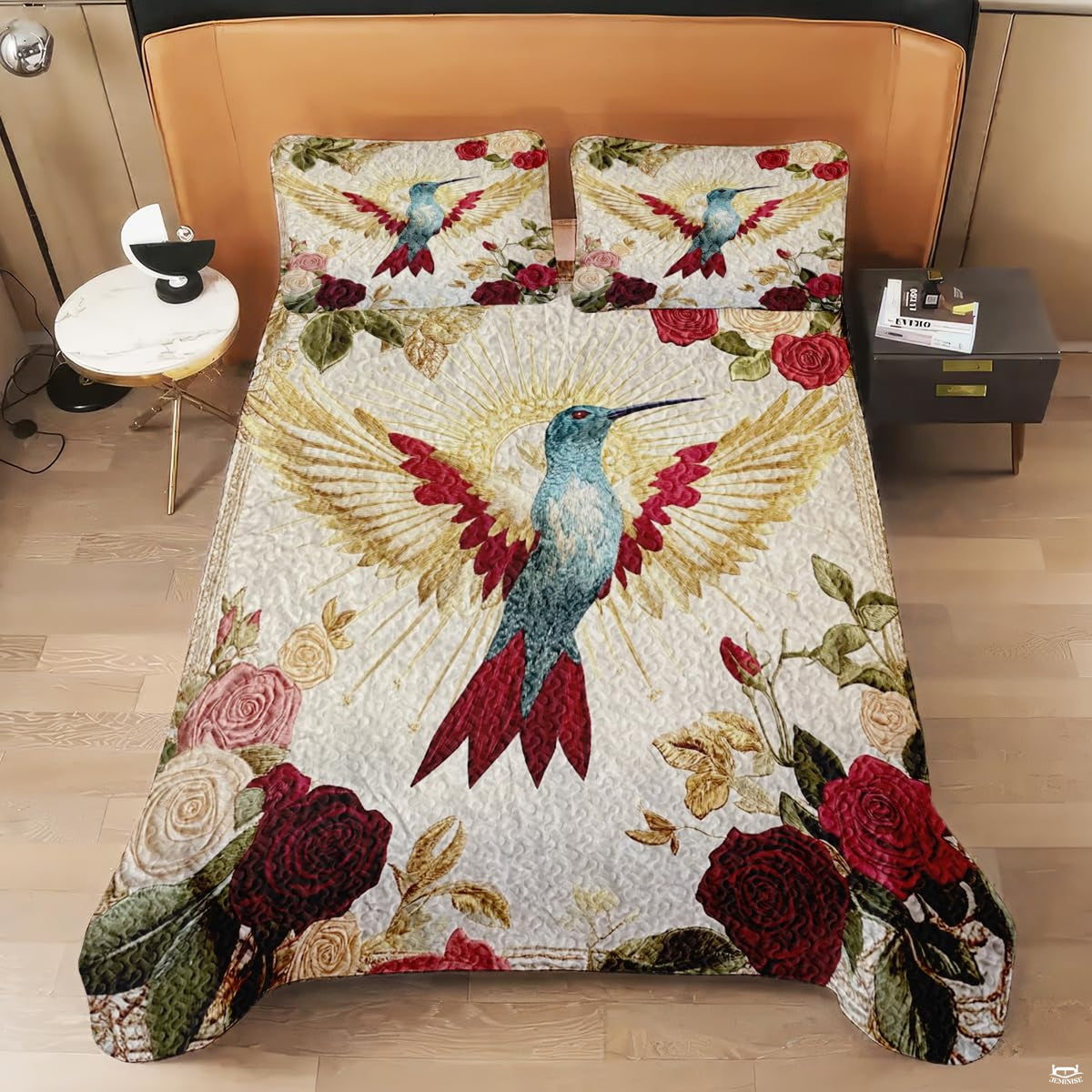 Overhead view of rose hummingbird design with golden sunburst rays