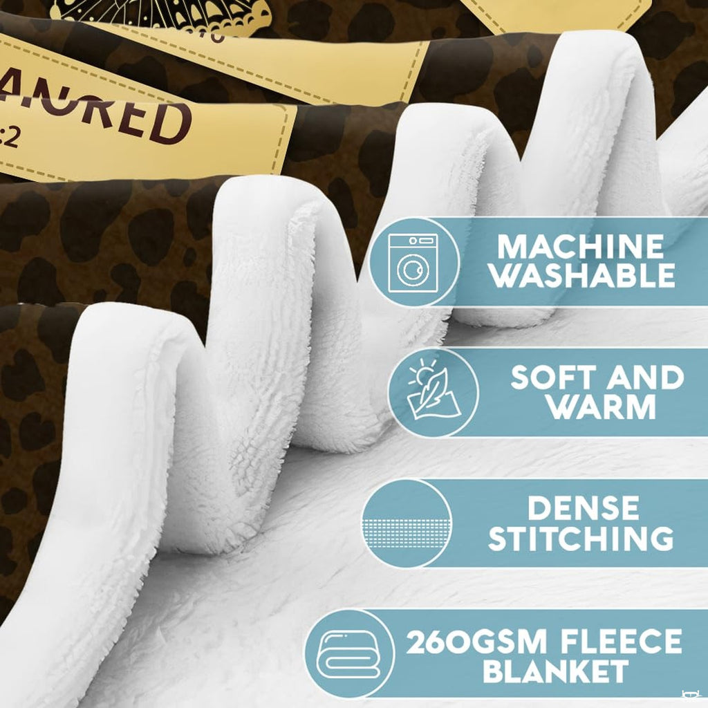 Overhead view of butterfly leopard print bedding displaying thematic accent safari patterning and silhouette artwork.
