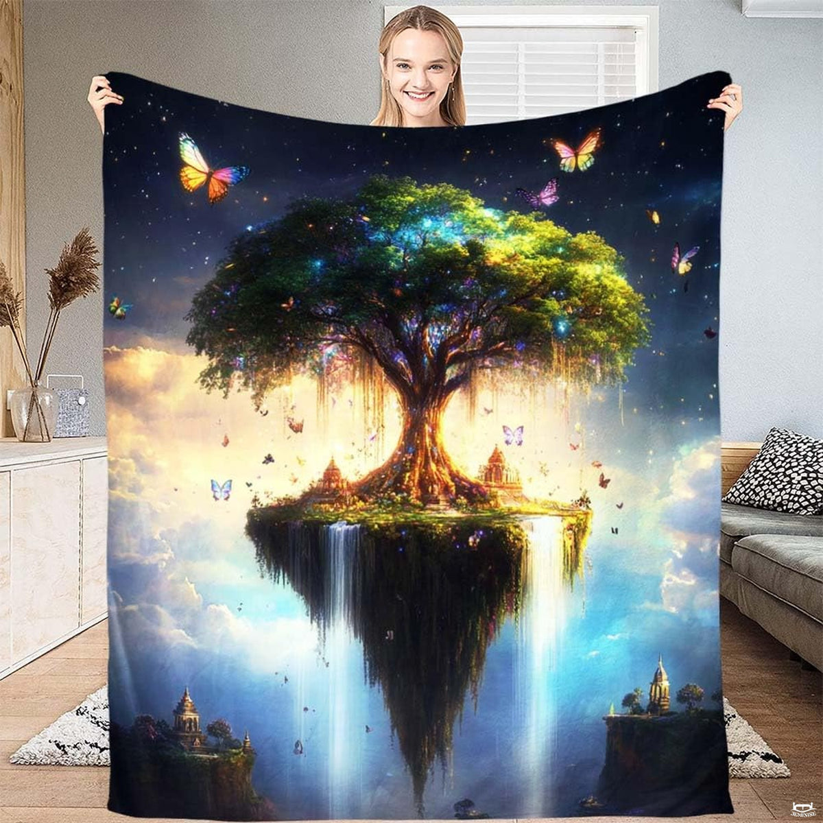 Floating island Tree of Life throw blanket featuring waterfalls cascading from rock island into clouds