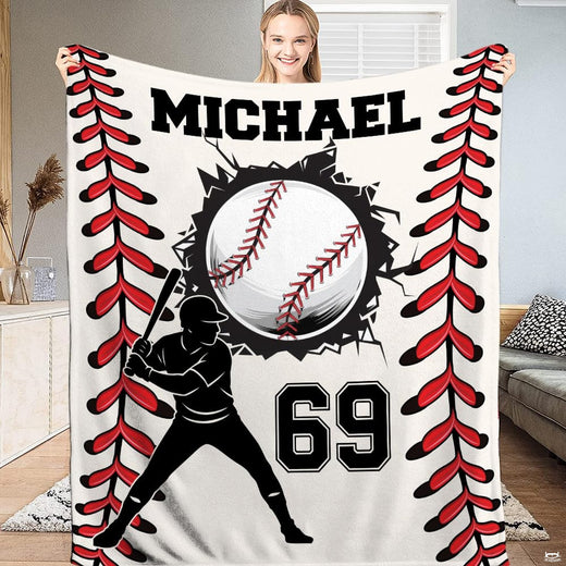 Baseball player silhouette with fractured ball and red lacing tracks, view 1.