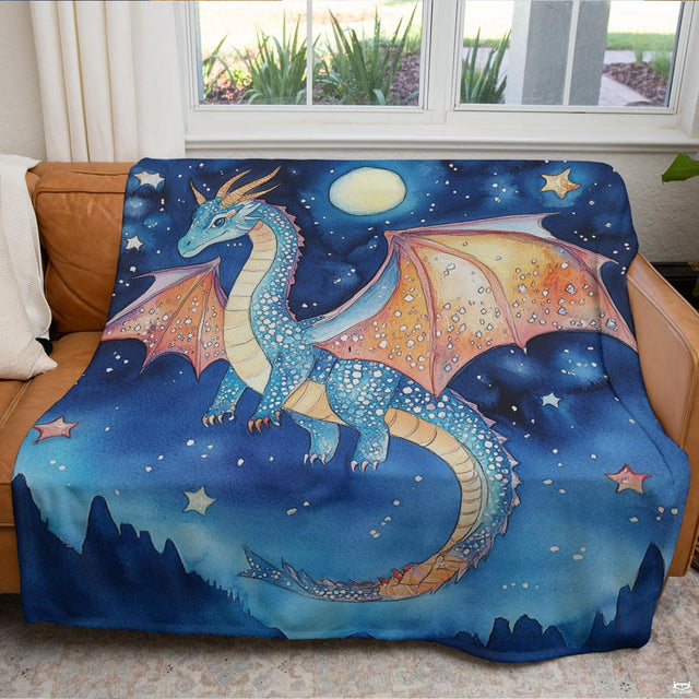 Close-up of starry night bedazzled art motif with blue dragon, speckled amber wings, and night sky.