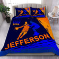 Grunge paint basketball bedding featuring offensive player in orange driving past blue defender on navy background
