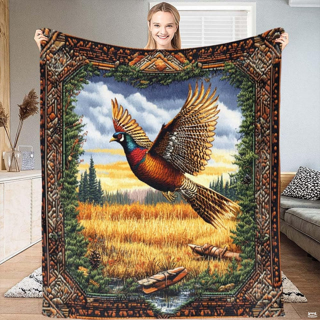 Flying pheasant wildlife tapestry throw blanket featuring pheasant in flight over autumn meadows with carved border