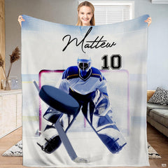 Ice hockey goalie puck save at net graphic blanket held upright