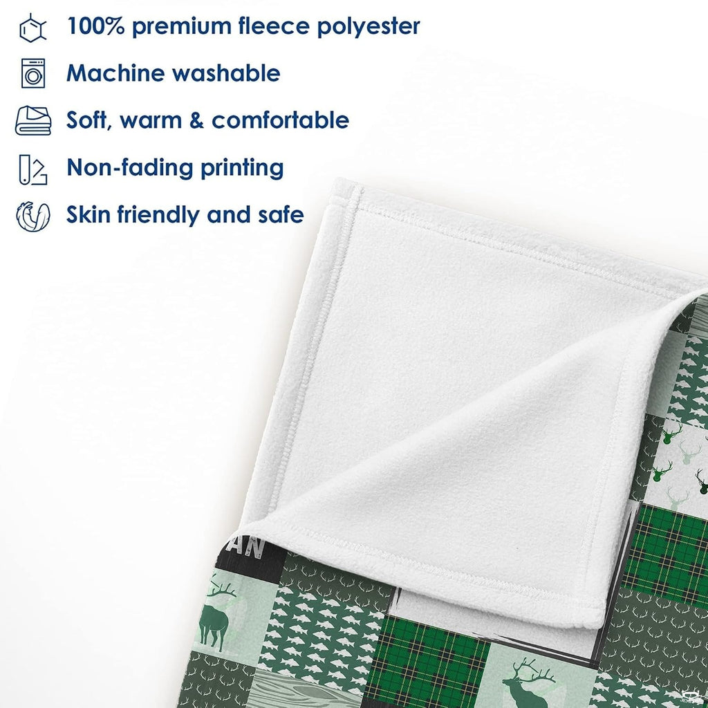 Green baby blanket neatly folded inside modern nursery crib displaying plush fleece texture
