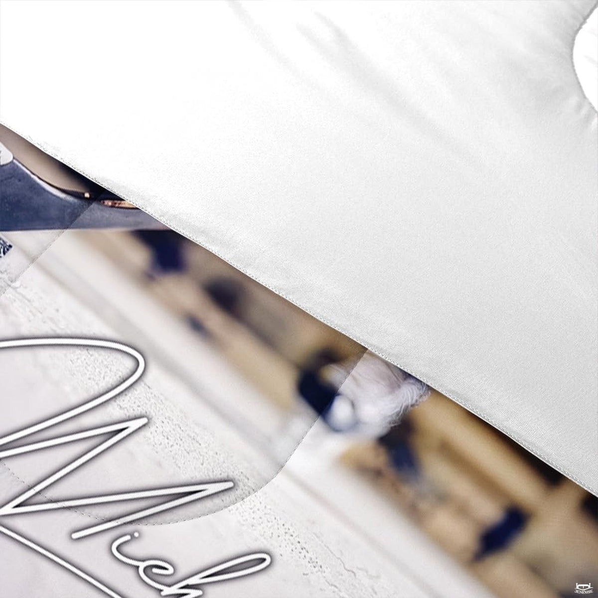 Folded presentation of ice hockey bedding displaying sharp graphic clarity in rust mahogany and silver tones