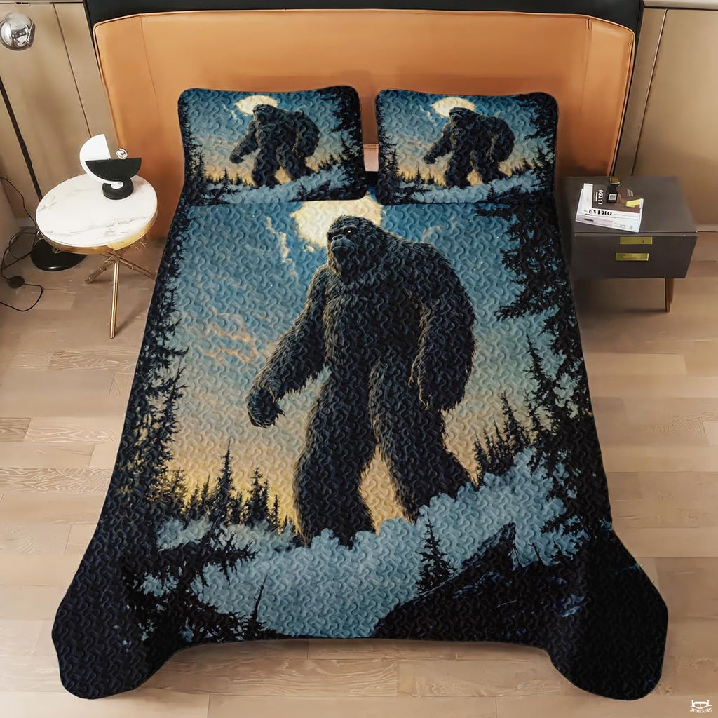 Bigfoot pine woodland graphic set against midnight blue evening sky on lodge bedding.