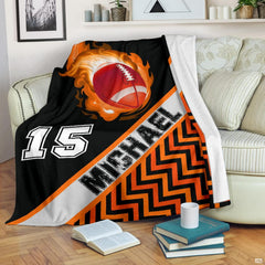 Close view of flaming comet football and orange flames on blanket