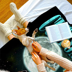 Wildlife bed sheets with detailed wolf illustration set against green celestial nebula tones.
