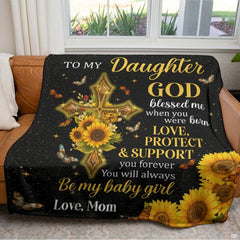 Living room couch styled with the Christian sunflower cross daughter keepsake throw blanket