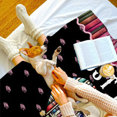 Cute bookworm girl throw blanket view 3 highlighting cartoon reader, heart bookcase, and floral roses