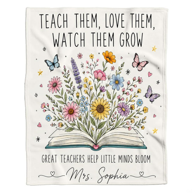 Floral teacher throw blanket displayed on a couch in a bright living room