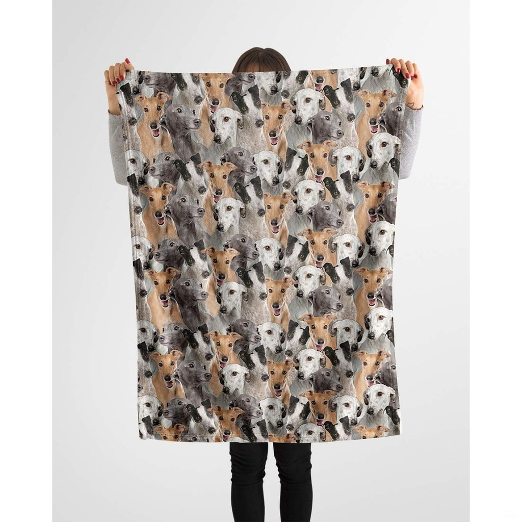 Person holding up a repeating Greyhound canine blanket against a plain background.