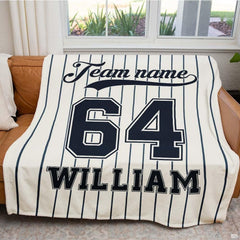 Navy blue pinstripes and varsity jersey motifs integrated into a classic bed sheet set arrangement.