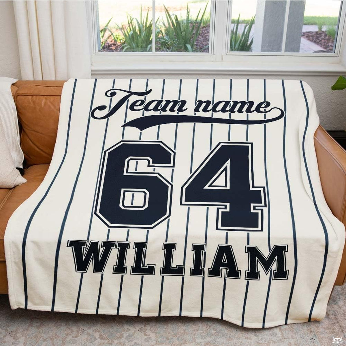 Navy blue pinstripes and varsity jersey motifs integrated into a classic bed sheet set arrangement.