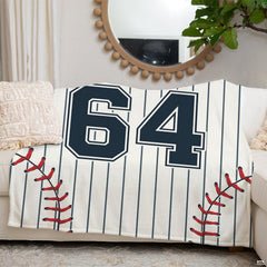 Angle view showcasing off-white cream backdrop with navy vertical pinstriped jersey patterns.