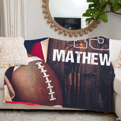 Close-up view of football illustration with white laces and draped stars and stripes print.